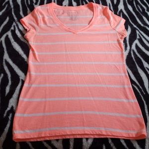 Bright salmon colored shirt with white stripes